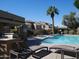 Relaxing community pool with lounge chairs and BBQ area, perfect for enjoying the Arizona sunshine at 7950 E Starlight Way # 128, Scottsdale, AZ 85250