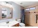 Well-lit bathroom with tiled shower and neutral color palette at 8421 W Alex Ave, Peoria, AZ 85382