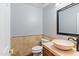 Stylish powder room featuring a vessel sink, neutral colors, and updated fixtures at 8421 W Alex Ave, Peoria, AZ 85382