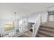 Carpeted staircase leading to the bright, open floorplan at 8421 W Alex Ave, Peoria, AZ 85382