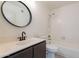 Neutral bathroom with vanity and shower over tub at 8772 W Grovers W Ave, Peoria, AZ 85382