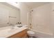 Bathroom featuring a single sink vanity, framed mirror, and a tub with shower at 9705 E Butte St, Mesa, AZ 85207