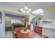 View of dining area, kitchen, and living room creates an open floor plan at 9806 W Long Hills Dr, Sun City, AZ 85351