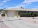 Charming single-story home featuring a two-car garage, low-maintenance landscaping, and a welcoming facade at 9806 W Long Hills Dr, Sun City, AZ 85351