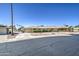 Charming single-story home featuring a two-car garage, low-maintenance landscaping, and a welcoming facade at 9806 W Long Hills Dr, Sun City, AZ 85351