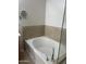 The bathroom has a soaking tub with tile surround at 11000 N 77Th Pl # 1072, Scottsdale, AZ 85260