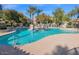 Beautifully maintained community pool with sparkling water and plenty of seating for residents and guests at 11000 N 77Th Pl # 1072, Scottsdale, AZ 85260