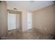 Bedroom with white doors at 1111 E Village Circle N Dr, Phoenix, AZ 85022