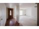 Hallway leading to the entryway, the living room, and bedrooms at 1111 E Village Circle N Dr, Phoenix, AZ 85022