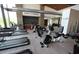 Bright fitness center with modern equipment, stone accents, and inspiring decor at 1115 E Mcneil St, Phoenix, AZ 85042