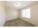 Bedroom with neutral paint, plush carpeting, and natural light at 11328 N 89Th Dr, Peoria, AZ 85345