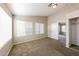 Bedroom features bright windows and doorway to hallway at 11328 N 89Th Dr, Peoria, AZ 85345