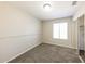 Bedroom with neutral paint, plush carpeting, and natural light at 11328 N 89Th Dr, Peoria, AZ 85345