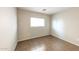 Bright bedroom with tile flooring and a window offering plenty of natural light at 11609 W Corrine Dr, El Mirage, AZ 85335