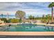 Sparkling pool, patio, and lush landscaping for tranquil outdoor living at 12530 W Skylark Dr, Sun City West, AZ 85375