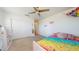 Bright bedroom with closet and colorful decor, perfect for  at 14420 W Faye Way, Surprise, AZ 85387