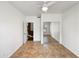 Bright bedroom featuring tile flooring, ample natural light, and a mirrored closet at 14645 S 25Th Pl, Phoenix, AZ 85048