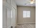 Cozy bedroom with neutral walls, plush carpet, and a ceiling fan for a relaxing ambiance at 1541 W Crape Rd, San Tan Valley, AZ 85140