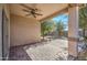 Covered outdoor patio area featuring pavers, a ceiling fan and views of the backyard at 1541 W Crape Rd, San Tan Valley, AZ 85140