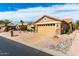 Charming single-story home featuring desert landscaping and a spacious two-car garage at 15492 W Whitton Ave, Goodyear, AZ 85395