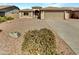 Charming single-story home with desert landscaping and a two-car garage in a peaceful community at 16370 W Rimrock St, Surprise, AZ 85388