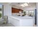 Well-lit kitchen featuring stainless steel appliances and ample countertop space at 16949 W Oasis Springs Way, Surprise, AZ 85387