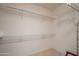 Spacious walk-in closet featuring wire shelving and ample storage space at 16949 W Oasis Springs Way, Surprise, AZ 85387