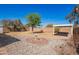 Backyard featuring desert landscaping with a bird bath and a covered patio at 1716 W Weldon Ave, Phoenix, AZ 85015