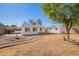 Backyard featuring a well-manicured lawn and a storage shed in a corner at 1716 W Weldon Ave, Phoenix, AZ 85015