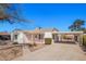 Charming single-story home with a light-colored exterior and a convenient covered carport at 1716 W Weldon Ave, Phoenix, AZ 85015