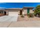 Well-maintained single-story home featuring desert landscaping and an attached two-car garage at 22754 W Moonlight Path, Buckeye, AZ 85326