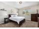 Relaxing bedroom with neutral tones, soft carpet, and a window view at 22754 W Moonlight Path, Buckeye, AZ 85326