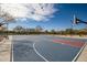 Community basketball court with well-maintained surface, hoops, and benches for players and spectators at 2425 W Bronco Butte Trl # 2024, Phoenix, AZ 85085