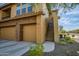 Two-story home featuring desert landscaping and a private stairway entrance at 2425 W Bronco Butte Trl # 2030, Phoenix, AZ 85085