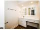 Well-lit bathroom with a vanity with sink and updated fixtures, offering a functional and inviting space at 2643 E Virginia Ave, Phoenix, AZ 85008