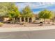 Charming home featuring a terracotta roof, stucco exterior, complemented by desert landscaping at 30259 N 125Th Ln, Peoria, AZ 85383