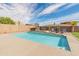 A private backyard featuring a sparkling pool and spa, perfect for enjoying sunny days in a serene setting at 30259 N 125Th Ln, Peoria, AZ 85383