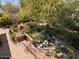 Beautiful landscaping with a rock waterfall feature that enhances the outdoor space, creating a serene and inviting atmosphere at 318 E Concorda Dr, Tempe, AZ 85282