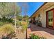 Charming backyard with desert landscaping, a cozy seating area, and a peaceful ambiance for outdoor enjoyment at 318 E Concorda Dr, Tempe, AZ 85282