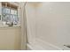 Bathroom with tile floors, white subway tile, and a shower-tub combination at 318 E Concorda Dr, Tempe, AZ 85282