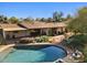 Stunning aerial view of a private pool surrounded by lush landscaping and a charming patio area for outdoor relaxation at 318 E Concorda Dr, Tempe, AZ 85282