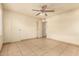 Bedroom featuring a ceiling fan and tile flooring at 3313 N 68Th St # 111, Scottsdale, AZ 85251