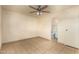 Spacious bedroom with neutral tones, ceiling fan, and tile flooring throughout at 3313 N 68Th St # 111, Scottsdale, AZ 85251