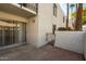 Cozy patio area with sliding glass doors leading into a well-maintained condo at 3313 N 68Th St # 111, Scottsdale, AZ 85251