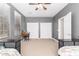 Bedroom featuring carpet, neutral walls, a ceiling fan, and bright natural light at 33731 N Slate Creek Dr, San Tan Valley, AZ 85143