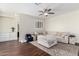 Spacious living room featuring modern fixtures, hardwood floors, and lots of natural light at 33731 N Slate Creek Dr, San Tan Valley, AZ 85143