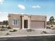 Contemporary home exterior featuring a two-car garage and desert landscaping at 34598 N Elmwood Way, San Tan Valley, AZ 85144