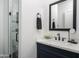 Contemporary bathroom with sleek vanity, elegant mirror, and modern fixtures at 3628 E Clarendon Ave, Phoenix, AZ 85018