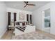 Serene main bedroom with stylish furnishings, decorative rug, and ensuite bathroom access at 3628 E Clarendon Ave, Phoenix, AZ 85018