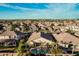 Scenic aerial view of neighborhood featuring a community golf course at 3887 E Andre Ave, Gilbert, AZ 85298